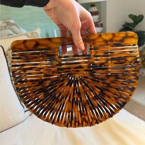 Tuckernuck Amber Bamboo plastic Clutch